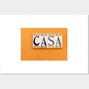 Village street in old Spanish town with Spanish word CASA in tiles on orange wall Posters and Art